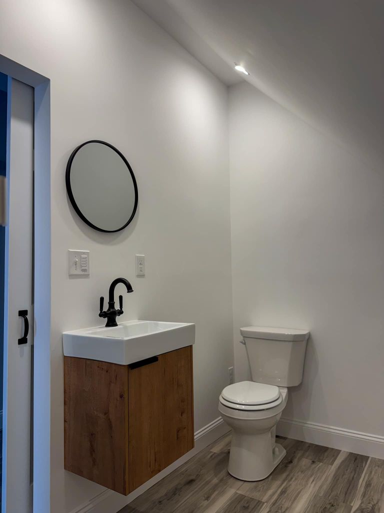 Half bath renovation with floating vanity in Maine