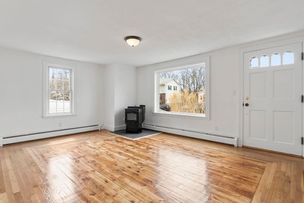 Living room property rehab in Maine